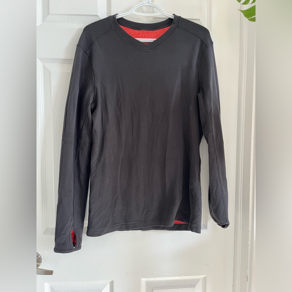 Lululemon long sleeve shirt, fits like a size medium.